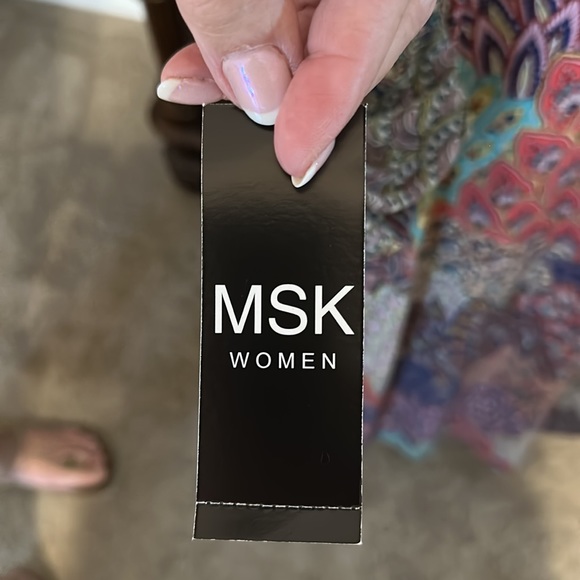 This is a soft boho midi dress with flutter sleeves.  Back has straps. - Picture 3 of 6